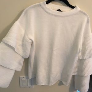 White sweater w ruffle sleeves